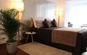 Superior Apartment, 1 Bedroom | Premium bedding, in-room safe, desk, iron/ironing board