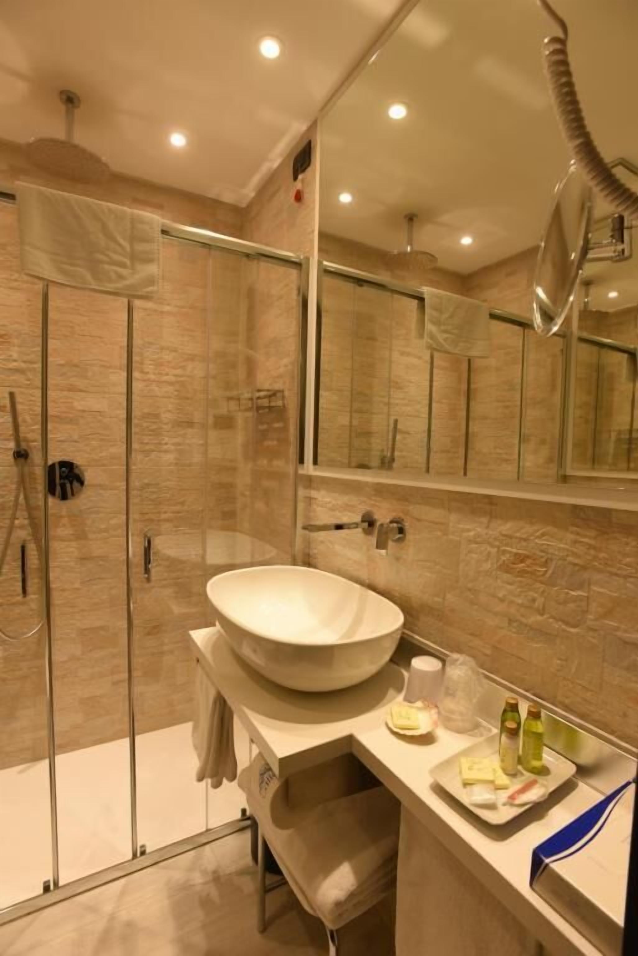 shower, free toiletries, hair dryer, bathrobes