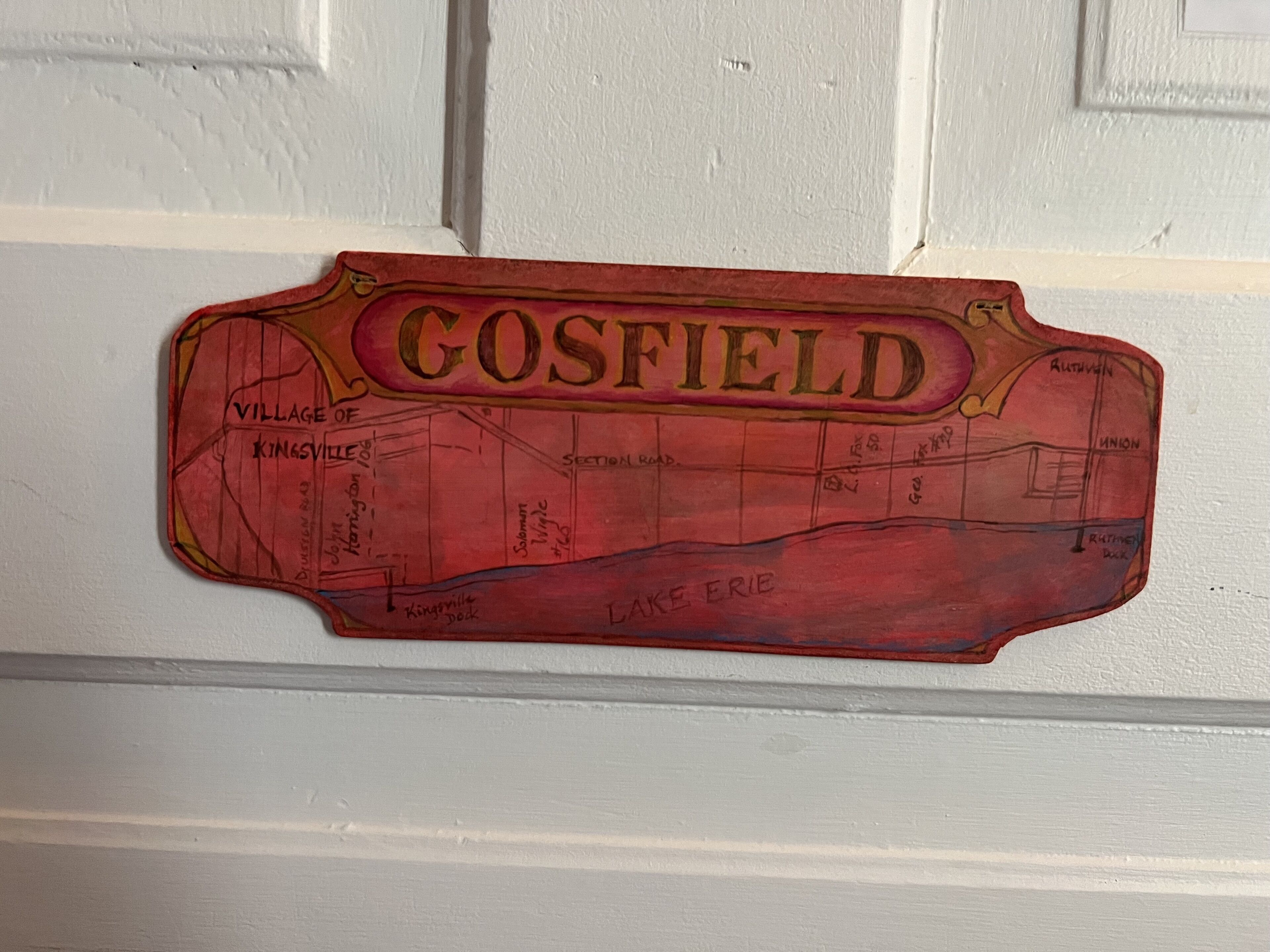 A red, hand-drawn map of Gosfield village with landmarks like Kingsville dock and Lake Erie.
