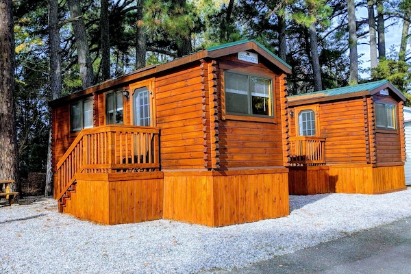 Log Cabin at Anvil Campground | Blackout drapes, iron/ironing board, free WiFi
