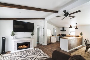 55-inch flat-screen TV with cable channels, TV, Netflix