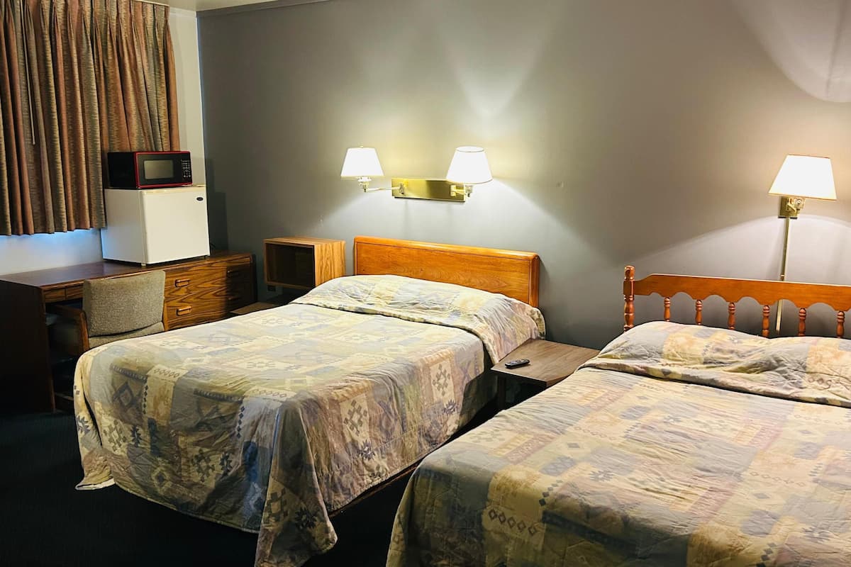Room, 2 Queen Beds, Non Smoking | Desk, iron/ironing board, bed sheets