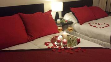 Premium bedding, desk, iron/ironing board, rollaway beds