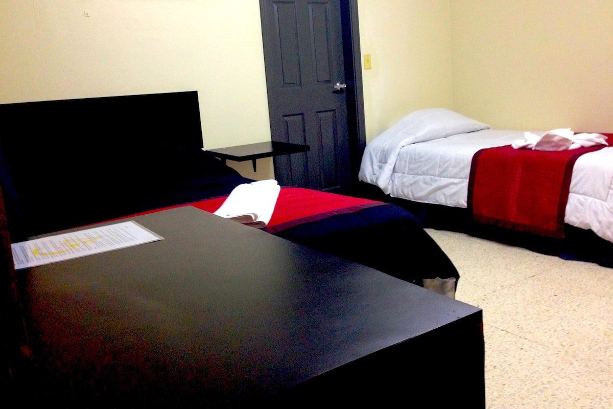 Premium bedding, desk, iron/ironing board, rollaway beds