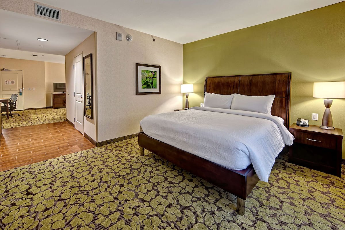 Desk, laptop workspace, blackout curtains, iron/ironing board