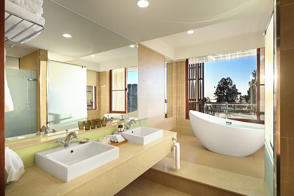historical building standard suite | bathroom | rainfall showerhead, designer toiletries, hair dryer, bathrobes