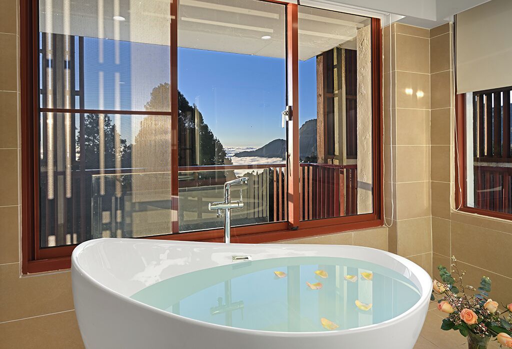 historical building standard suite | bathroom | rainfall showerhead, designer toiletries, hair dryer, bathrobes