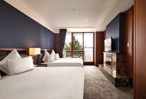Suíte luxo (Modern Building) | Roupas de cama premium, frigobar (abastecido com itens grátis)