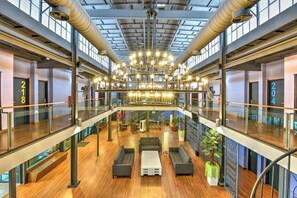 A spacious lobby with a high ceiling, modern chandelier, and multiple seating areas. - Sunday Malacca Near Jonker Street Formerly Quayside (Malacca City)