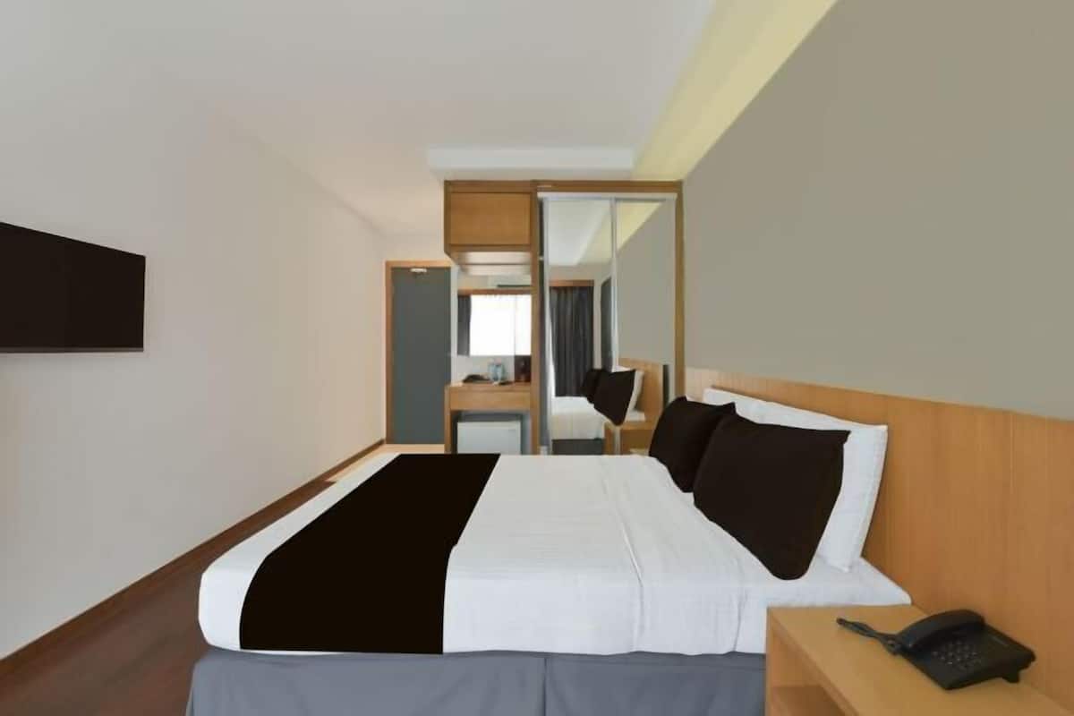 Ropa de cama de alta calidad y minibar