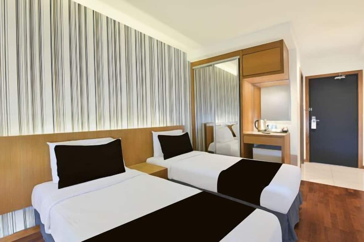 Ropa de cama de alta calidad y minibar