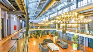 A spacious lobby with a high ceiling, modern lighting fixtures, and a mezzanine level. - Sunday Malacca Near Jonker Street Formerly Quayside (Malacca City)