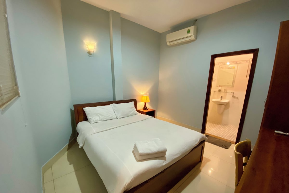 Desk, laptop workspace, blackout curtains, free WiFi