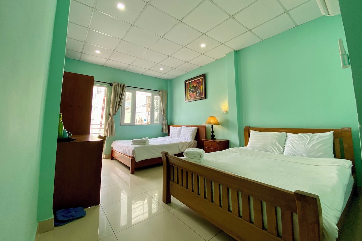 Family Triple Room, Multiple Beds, City View | Desk, laptop workspace, blackout curtains, free WiFi
