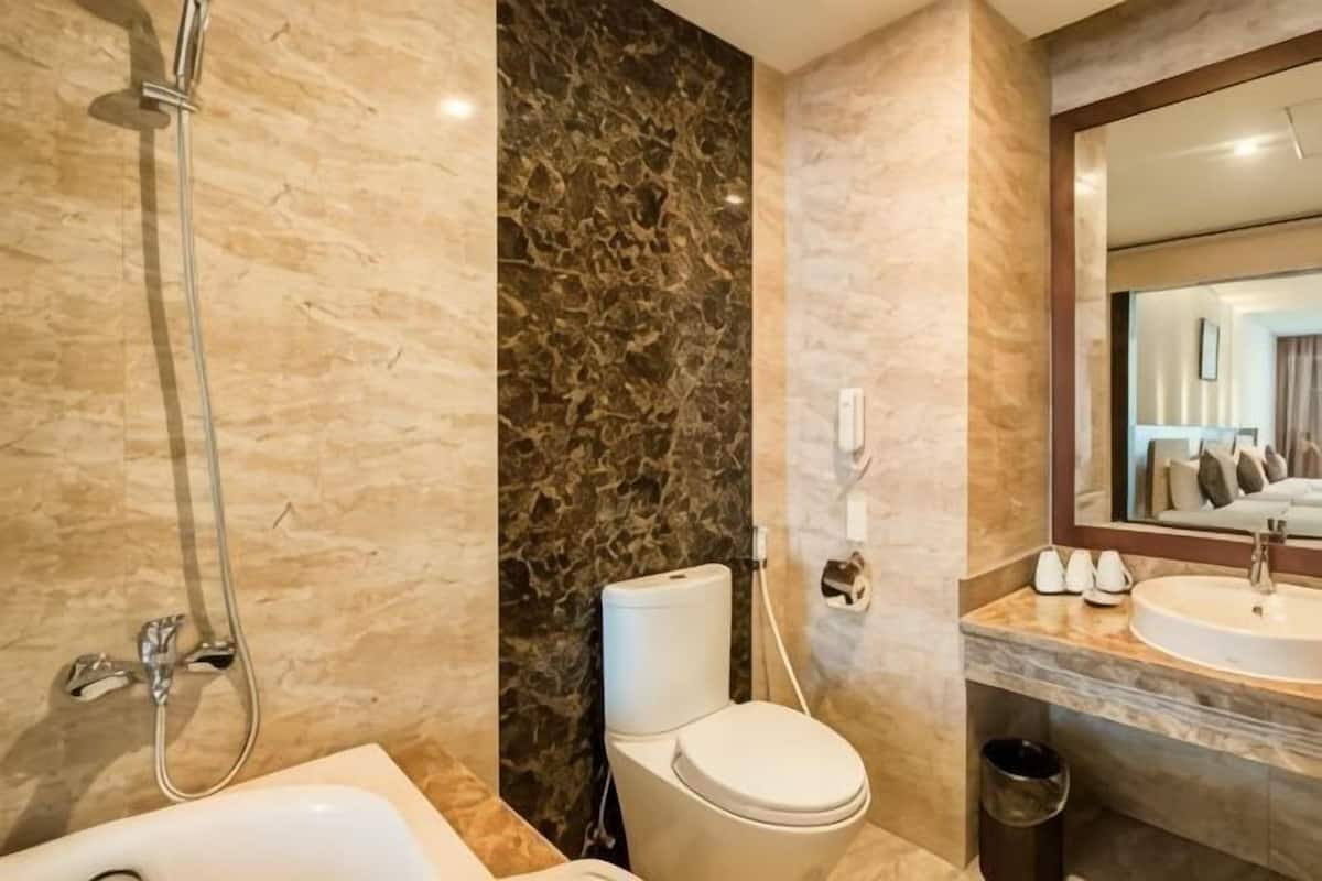 Shower, free toiletries, hair dryer, slippers