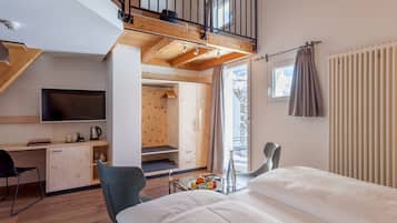 Habitación familiar | Área de sala de estar | Televisión LED, reproductor de DVD y películas de estreno