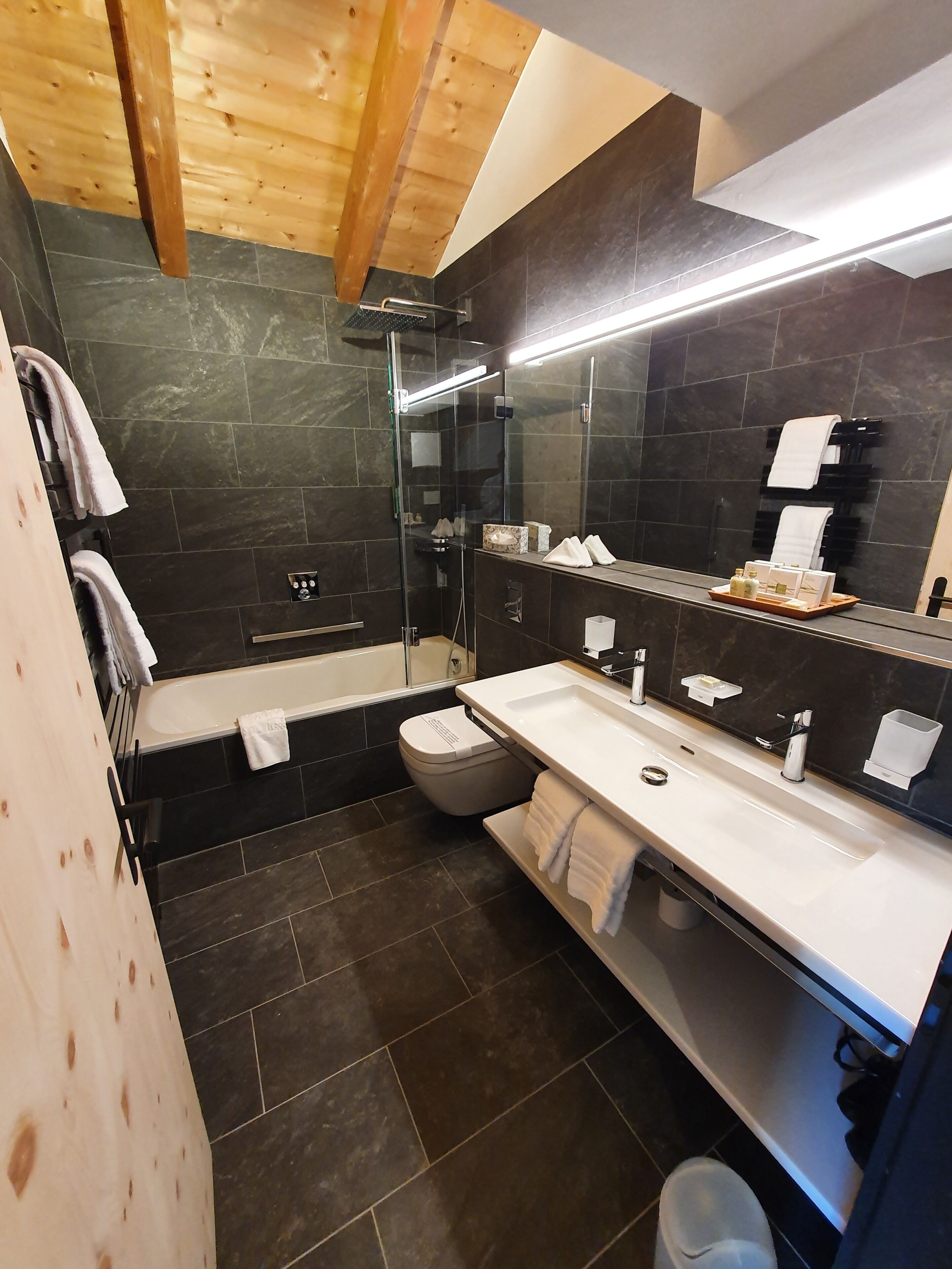 family room | bathroom | hair dryer, bathrobes, slippers, towels