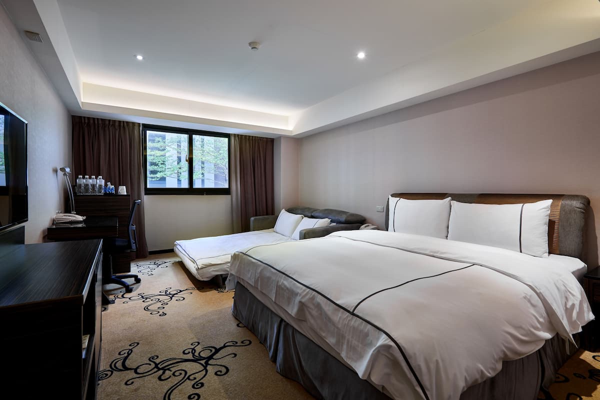 Executive Quadruple Room | 1 bedroom, premium bedding, in-room safe, desk