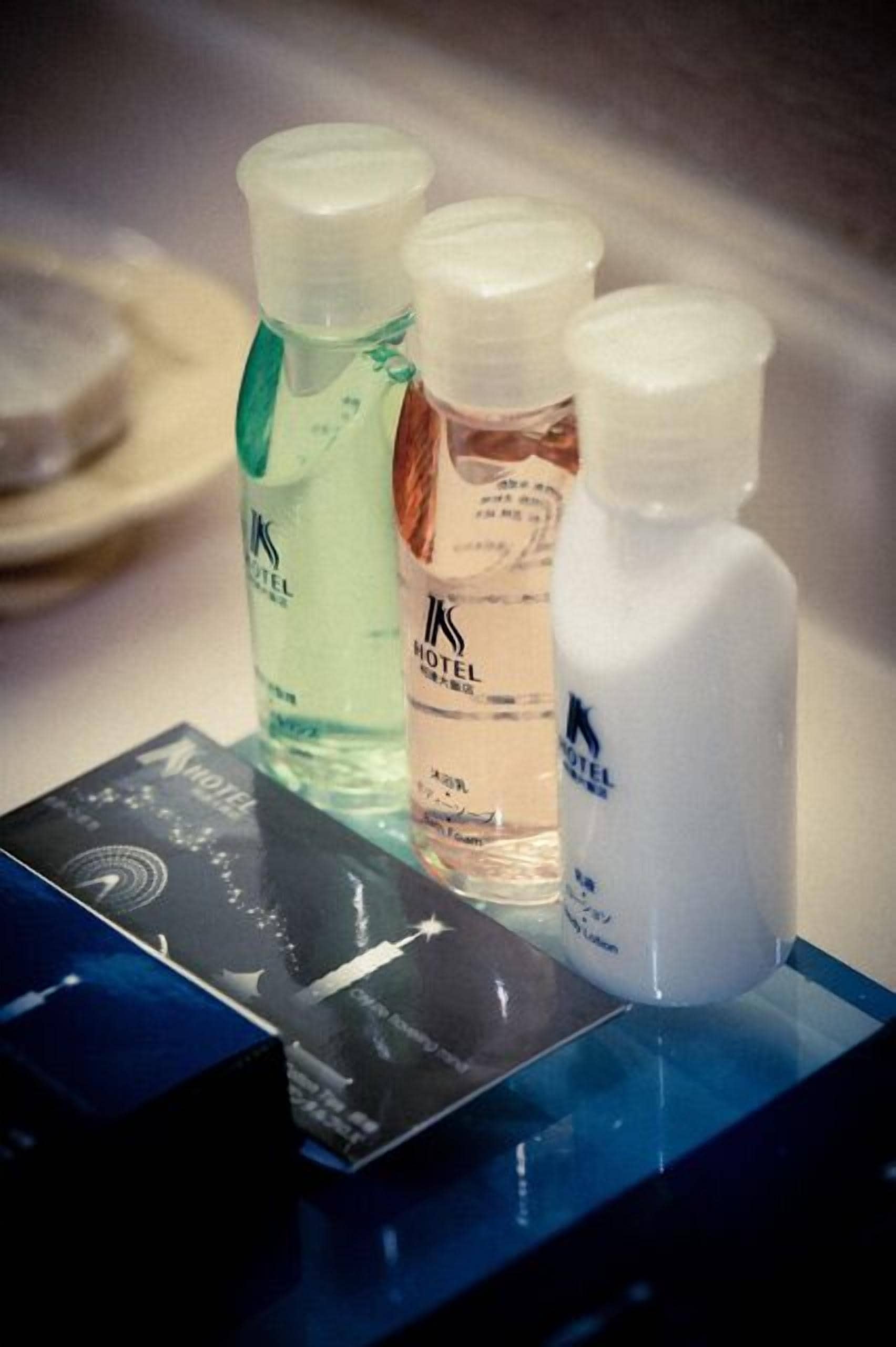 hair dryer, slippers, towels