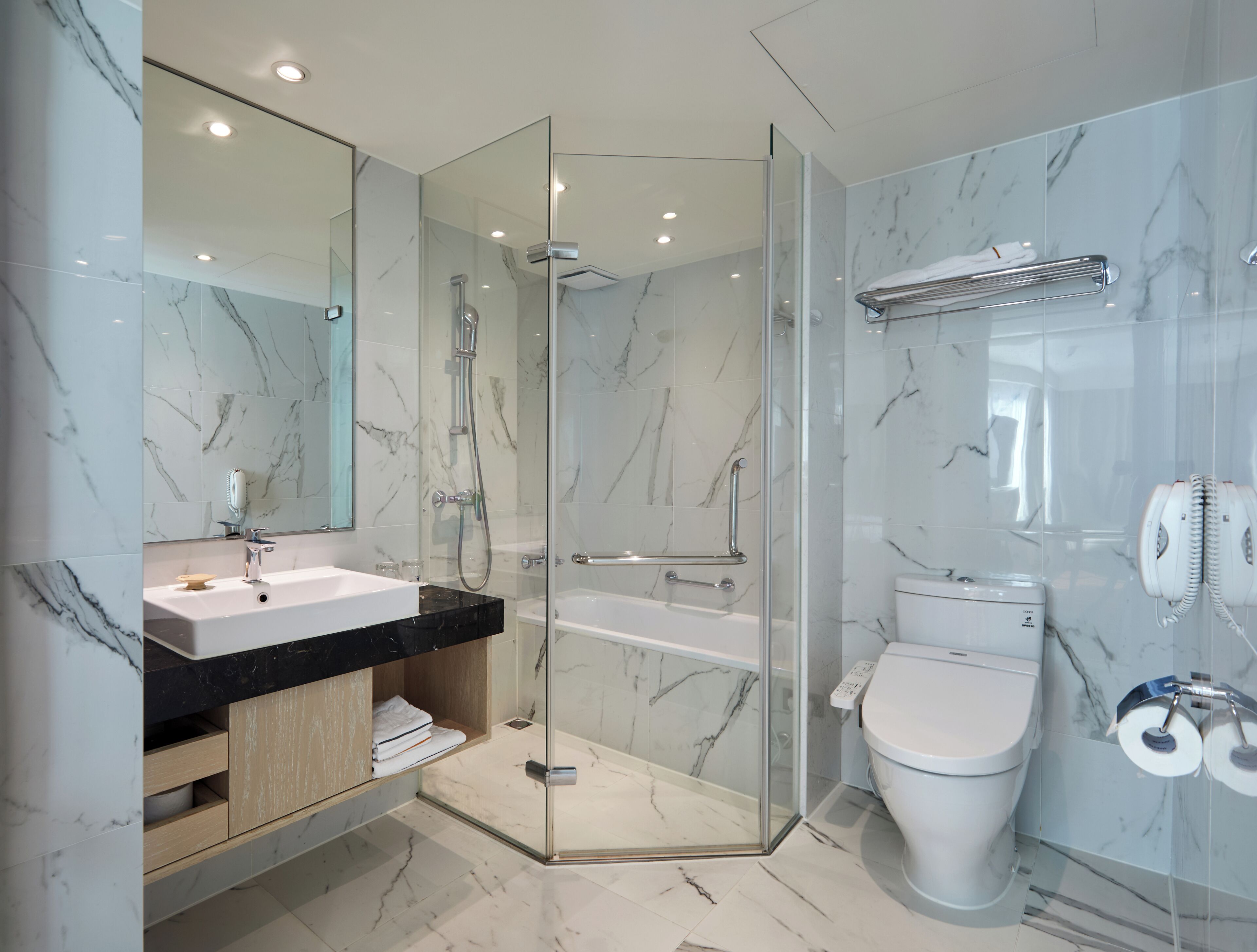 executive suite | bathroom | hair dryer, slippers, towels