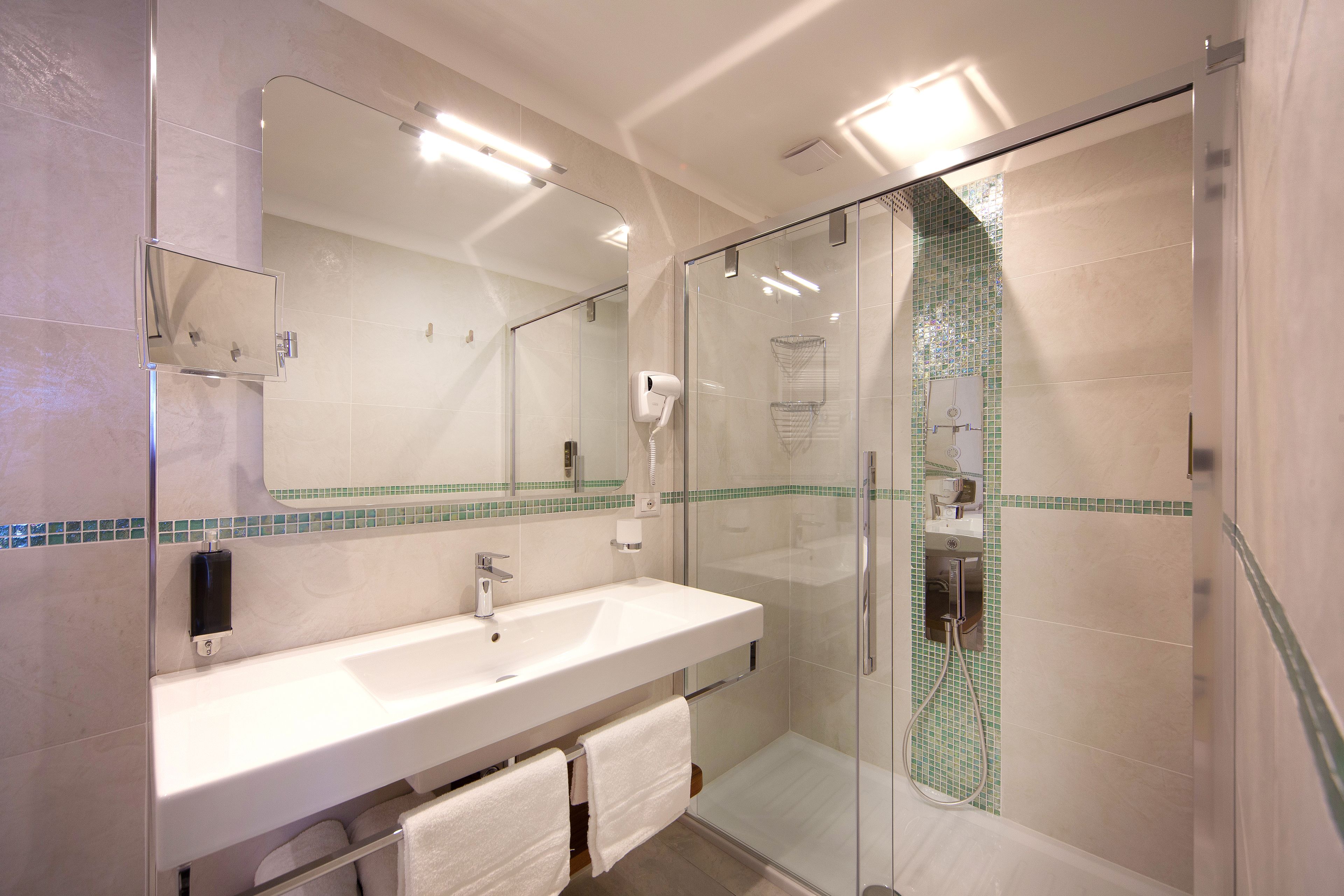 free toiletries, hair dryer, slippers, bidet