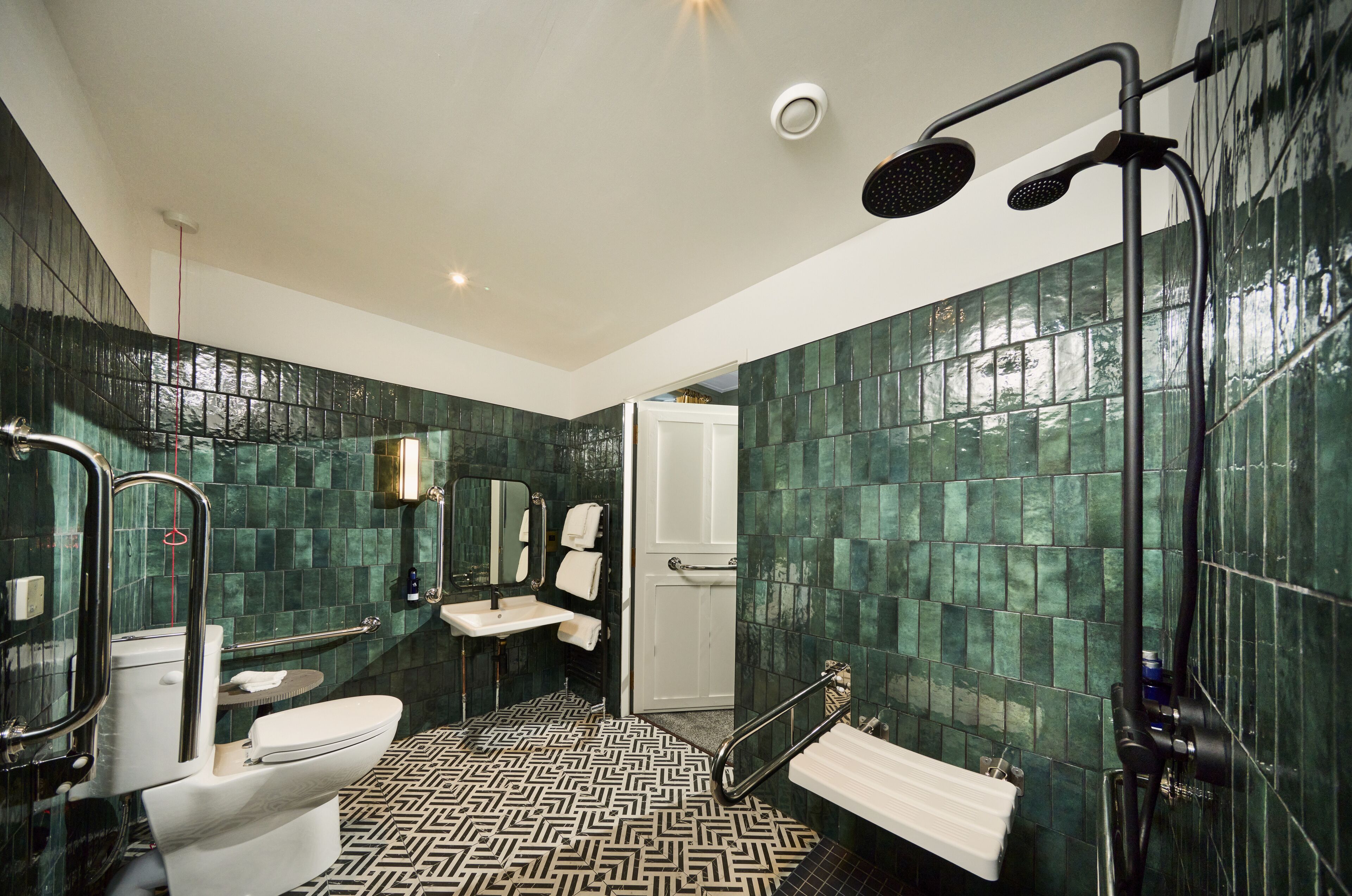 superior accessible guest room | bathroom | designer toiletries, hair dryer, towels