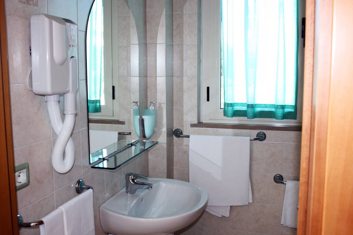 shower, free toiletries, hair dryer, bathrobes