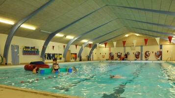 Swimmers can enjoy a structured swim in the pool, equipped with kickboards and floatation devices.