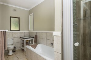 One Bedroom Family Apartment with Patio | Bathroom