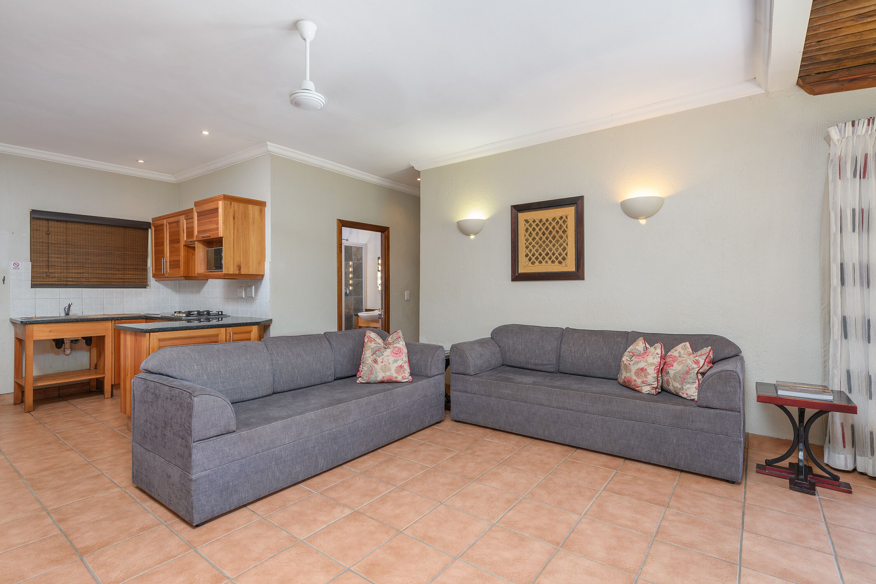 three bedroom chalet with patio | living room | tv