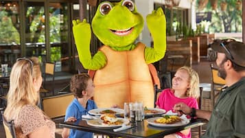 Guests can enjoy meals in this casual dining area with a lively atmosphere.