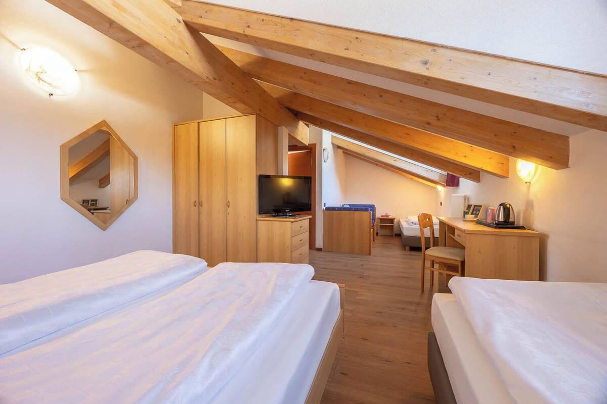 comfort quadruple room | in-room safe, desk