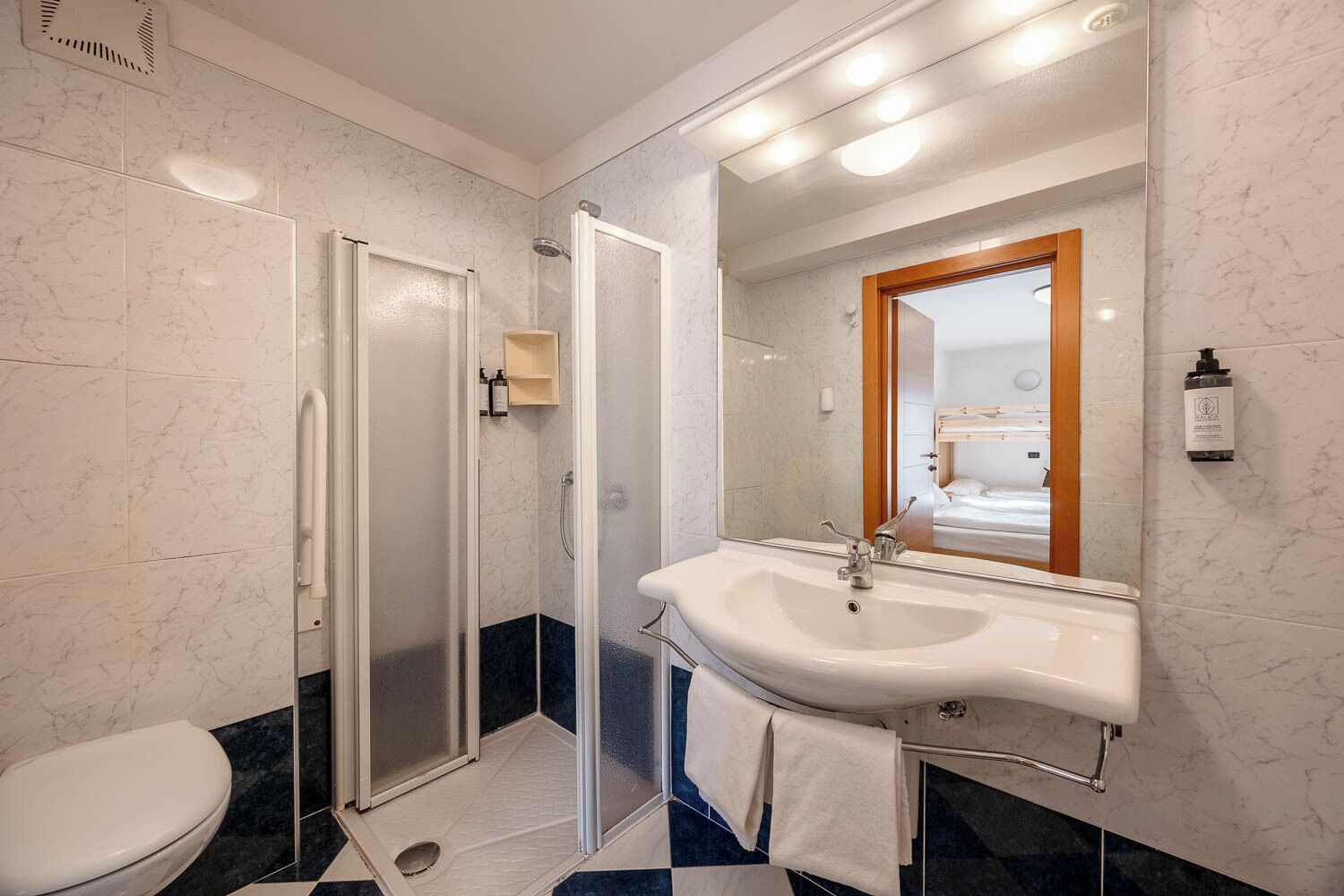 family room | bathroom | shower, free toiletries, hair dryer, towels