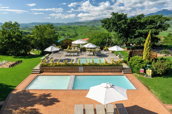 Outdoor pool, pool umbrellas, pool loungers