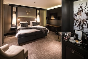 Premium bedding, memory-foam beds, in-room safe, desk