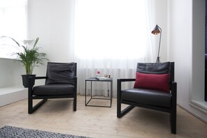 Superior Suite | Living area | Flat-screen TV, iPod dock - Maison Nationale (Antwerp)