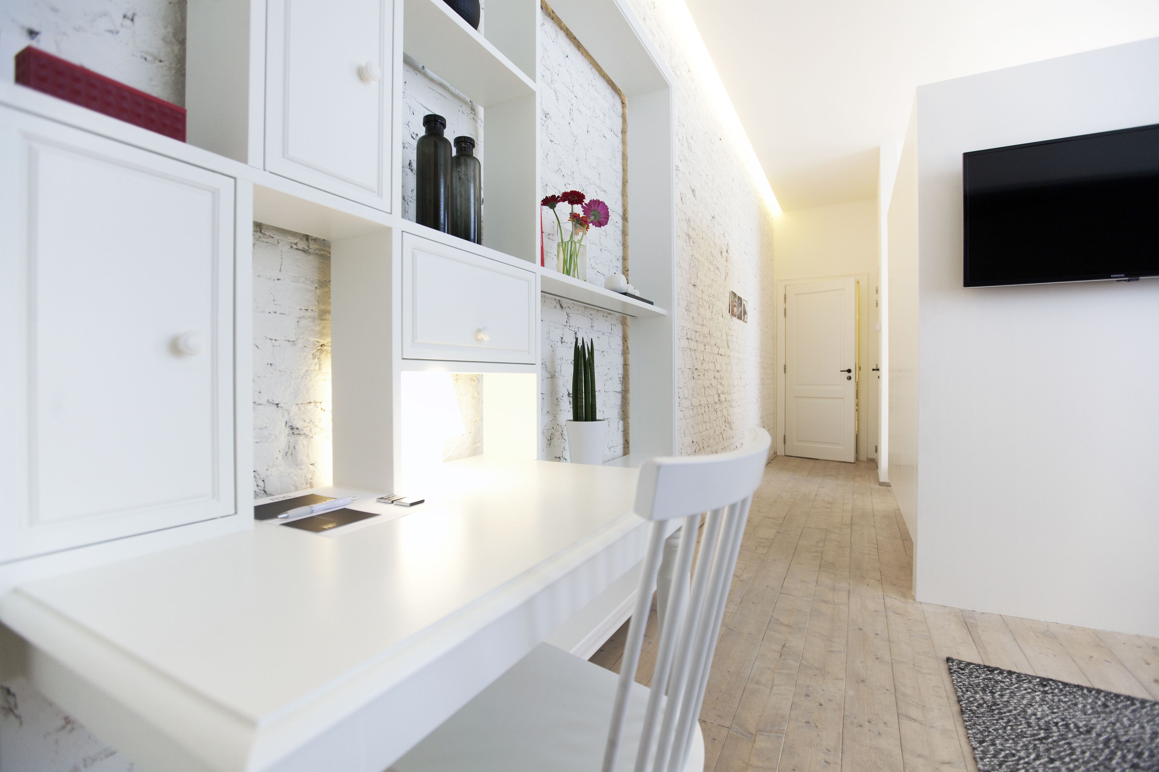 Suite superior | Área de sala de estar | Televisión de pantalla plana y estación para iPod 