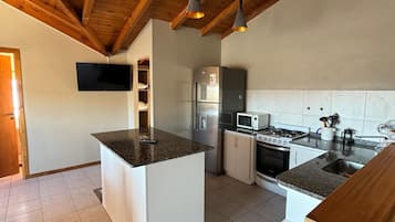 Deluxe Apartment, Mountain View | Private kitchen | Full-sized fridge, microwave, stovetop, cookware/dishes/utensils