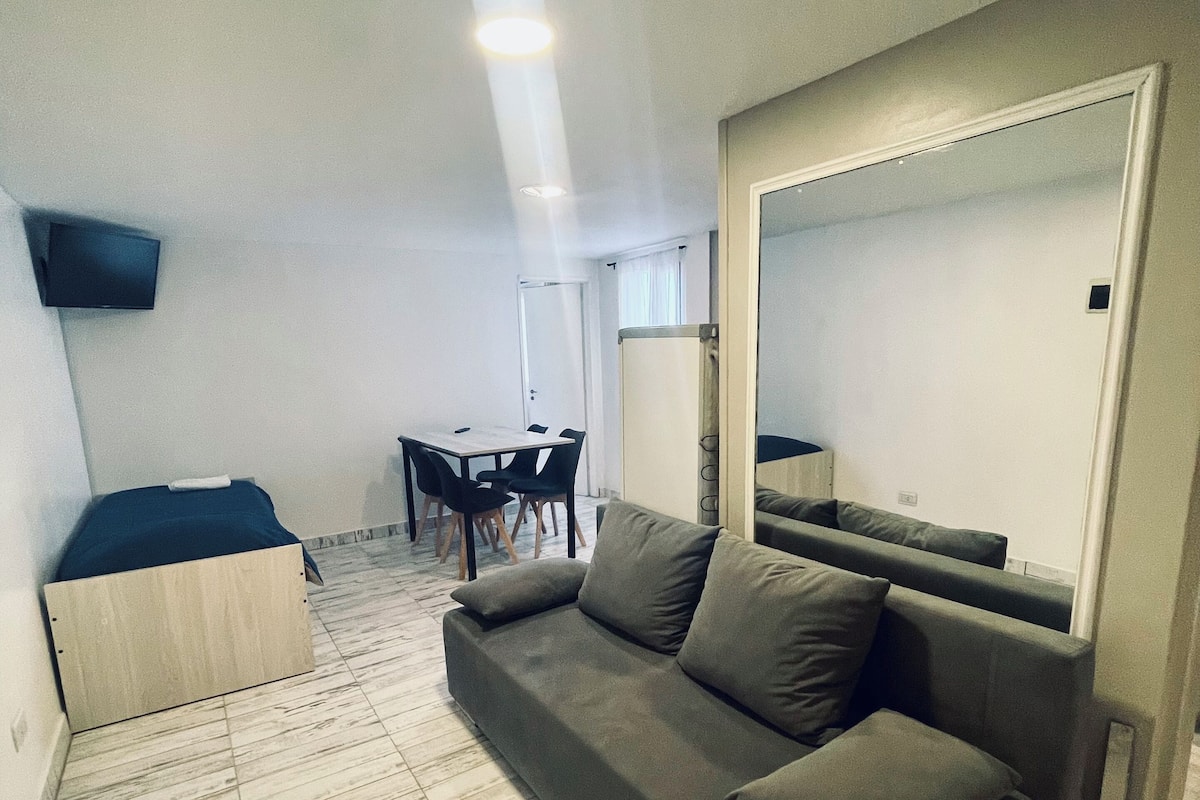 Superior Apartment | Living area | 24-inch TV with cable channels