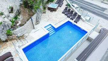 Outdoor pool, sun loungers