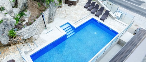 Outdoor pool, pool loungers