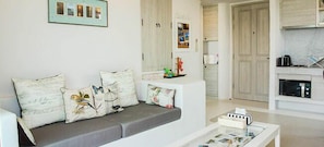 Apartment, 1 Bedroom | Living room | 32-inch flat-screen TV with cable channels, LED TV, DVD player - Chelona Khaotao Hua Hin E702 (Hua Hin)