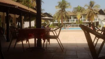 Dinner served, international cuisine, pool views