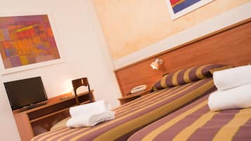 Family Triple Room | In-room safe, desk, iron/ironing board, free cots/infant beds