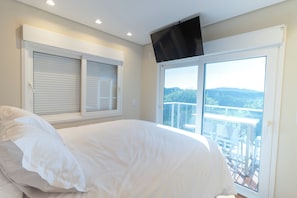 Deluxe Room | Minibar, in-room safe, blackout curtains, free WiFi - Pousada Ilha Faceira (Florianópolis)