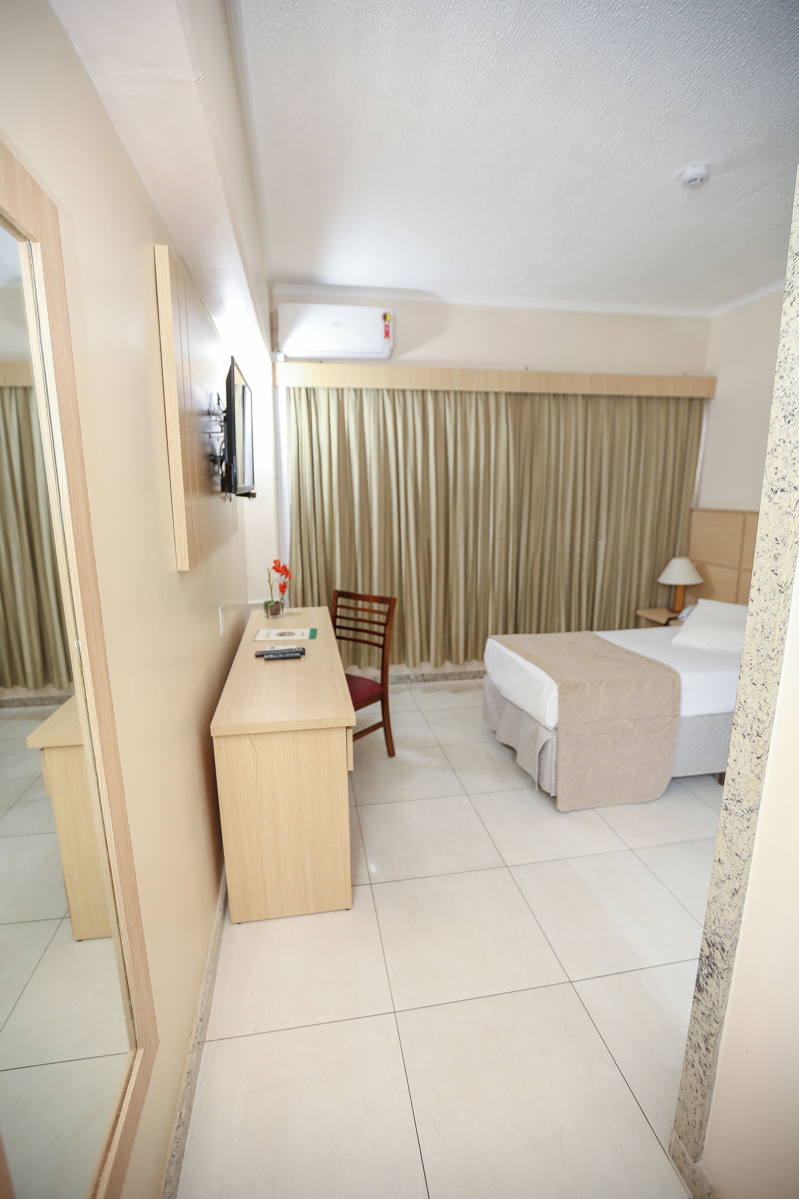 standard room (adapted) | minibar, in-room safe, desk, laptop workspace