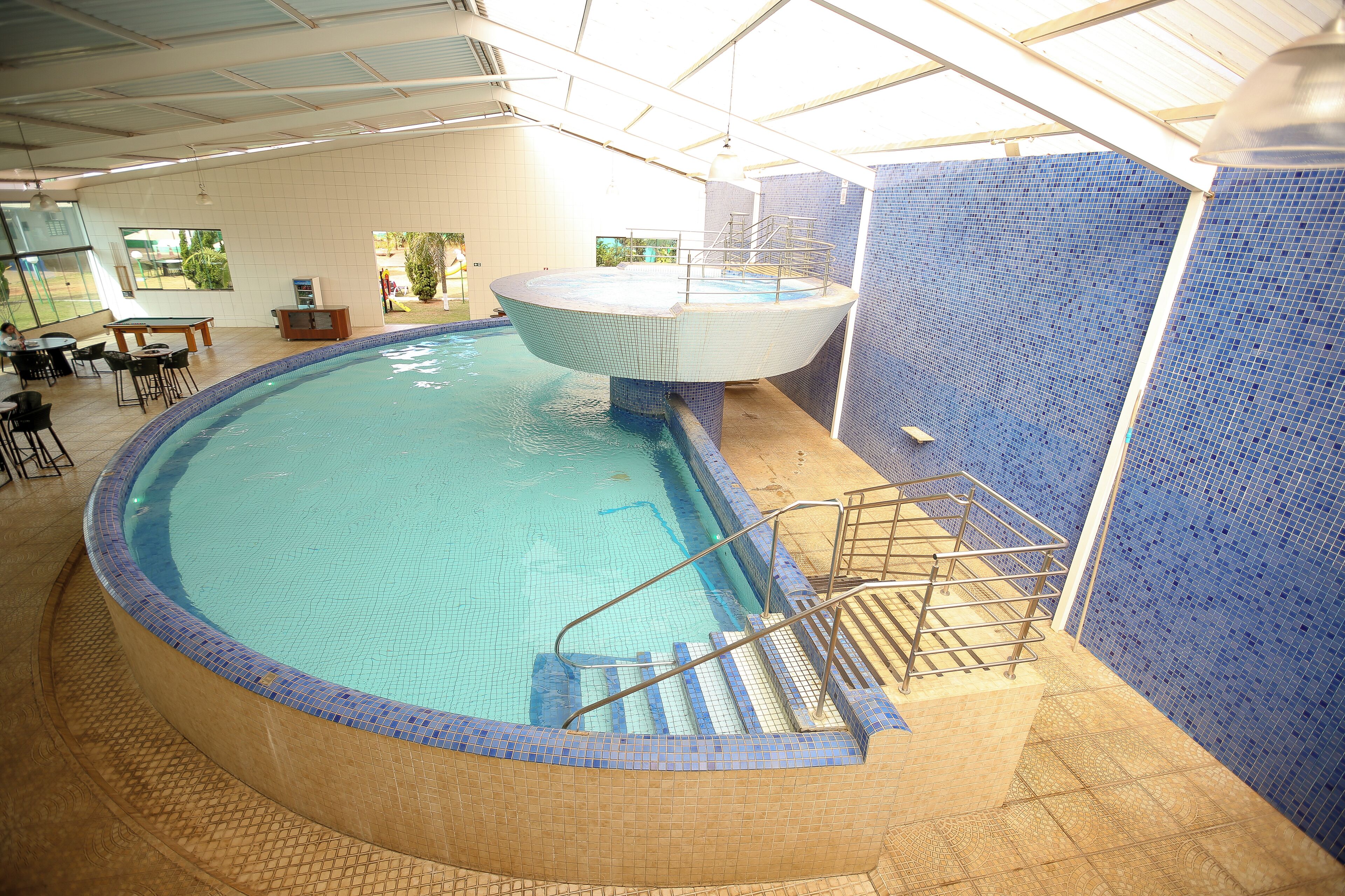 indoor pool, open 8:00 am to 10:00 pm, pool loungers