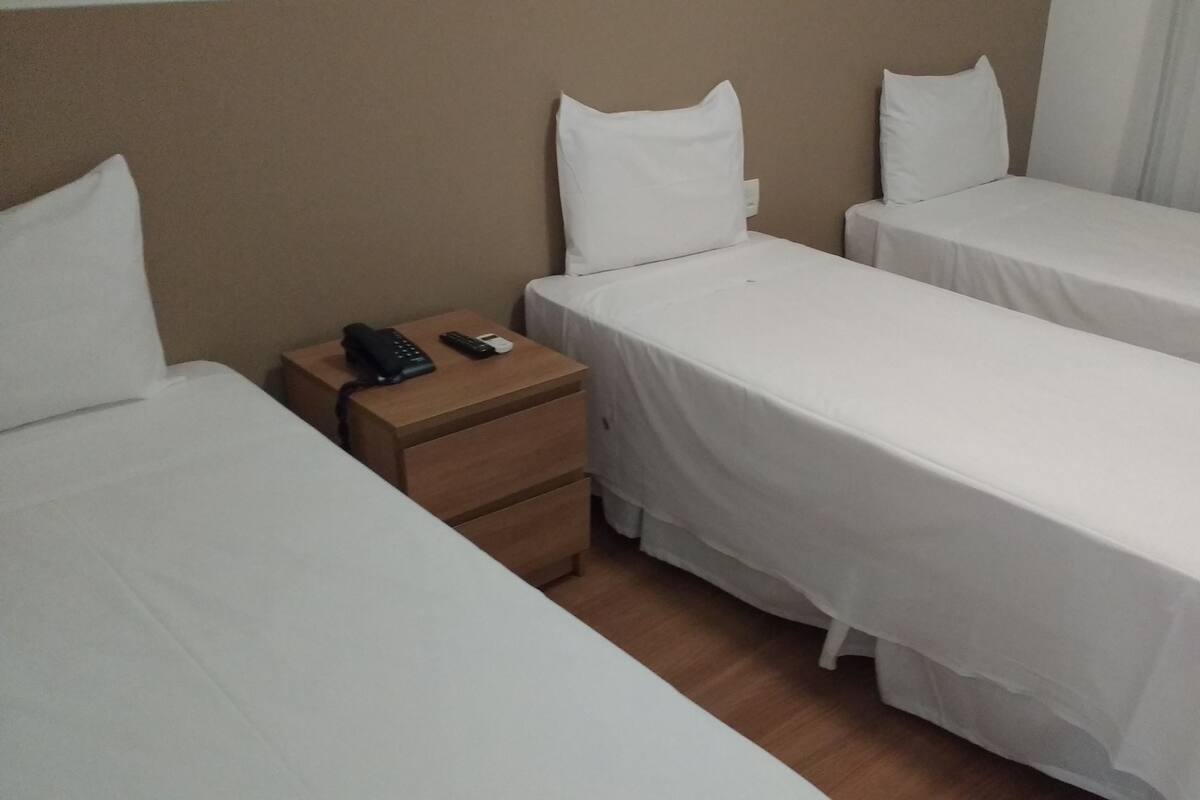 Triple Room | Desk, blackout curtains, free WiFi