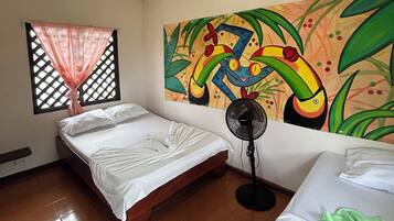 Family Twin Room, Beach View | Laptop workspace, free WiFi, bed sheets