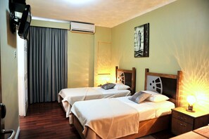 Signature Room, 1 King or 2 Single Beds | In-room safe, desk, laptop workspace, iron/ironing board - Culture Crossroads Inn (Port of Spain)